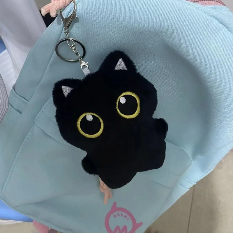 Lindo peluche de un gato negro - Photography Rules reseña y precio